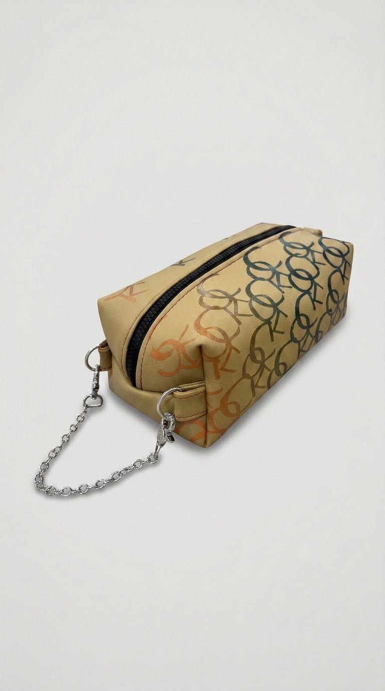 Tan Monogram Dopp Chain Handel