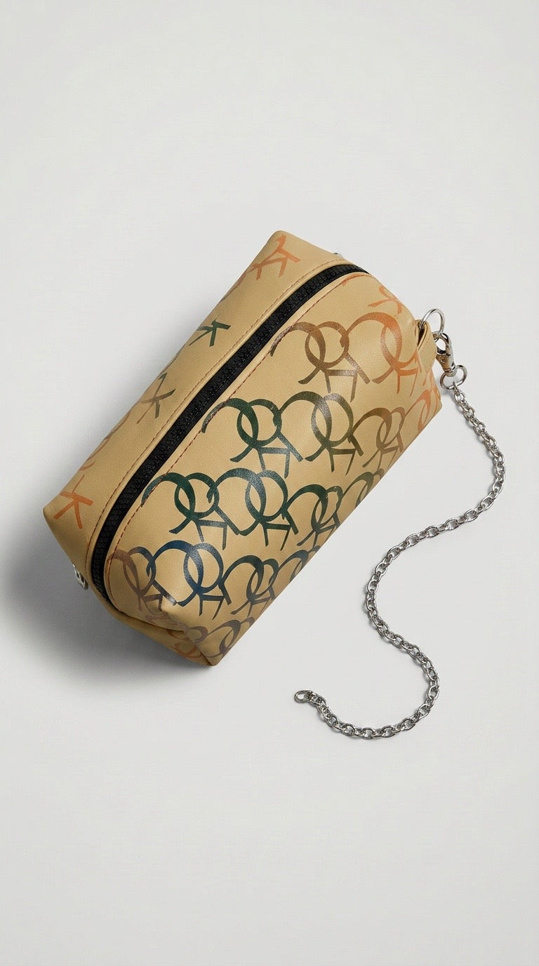 Tan Monogram Dopp Chain Handel