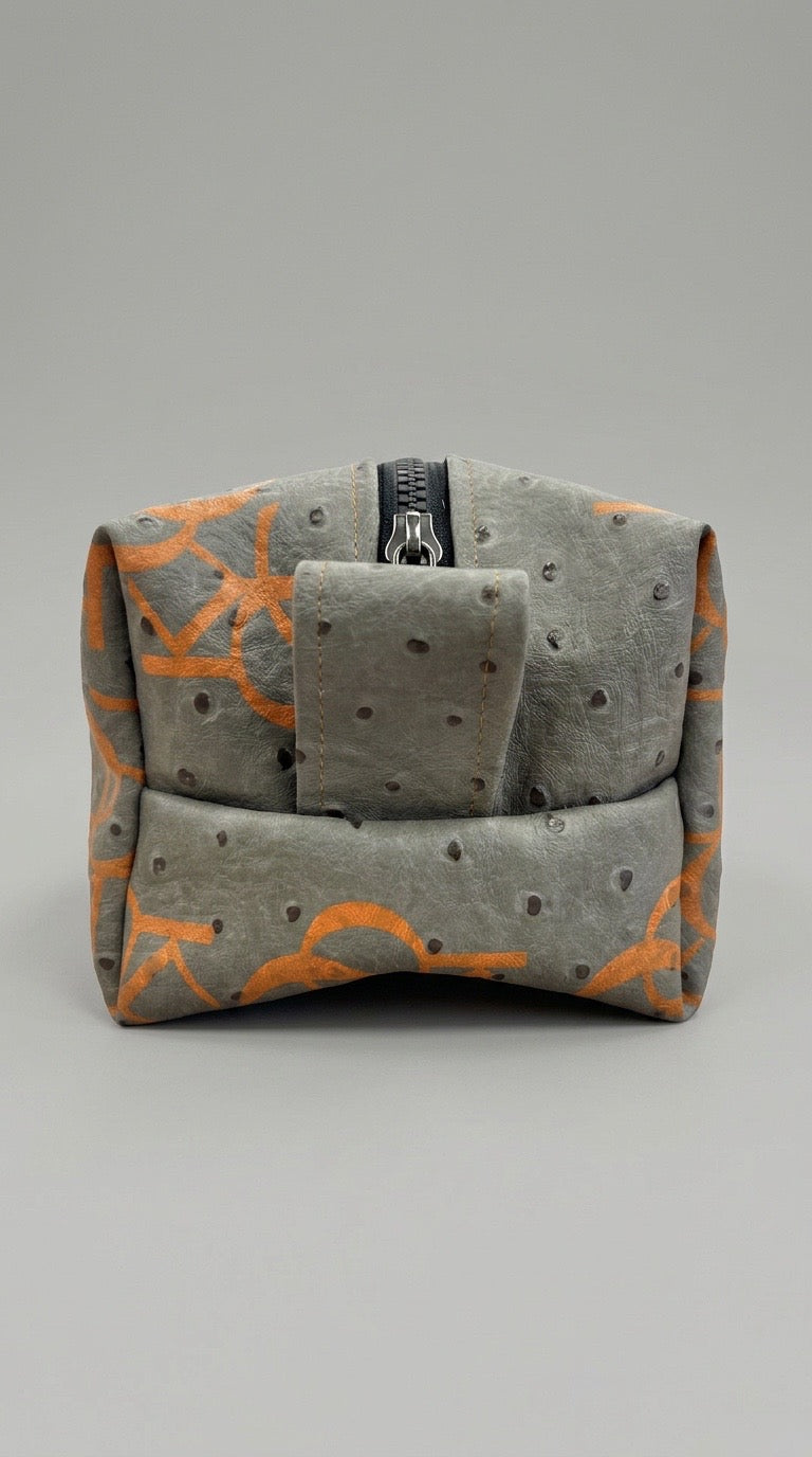 Gray  Monogram Ostrich Dopp kit