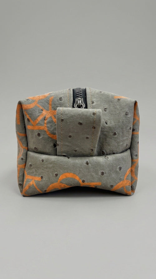 Gray  Monogram Ostrich Dopp kit